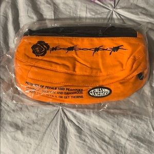 Petals and peacocks Fanny pack